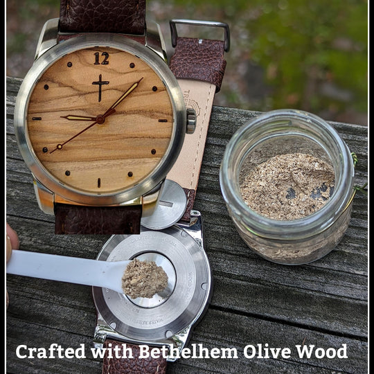 Watch made from Bethlehem olive wood with cremation ashes compartment and small jar of ashes.