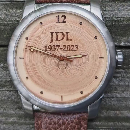 Living Tree Urn Watch showing personalized engraving, crafted from natural wood, honoring loved ones with a timeless design.