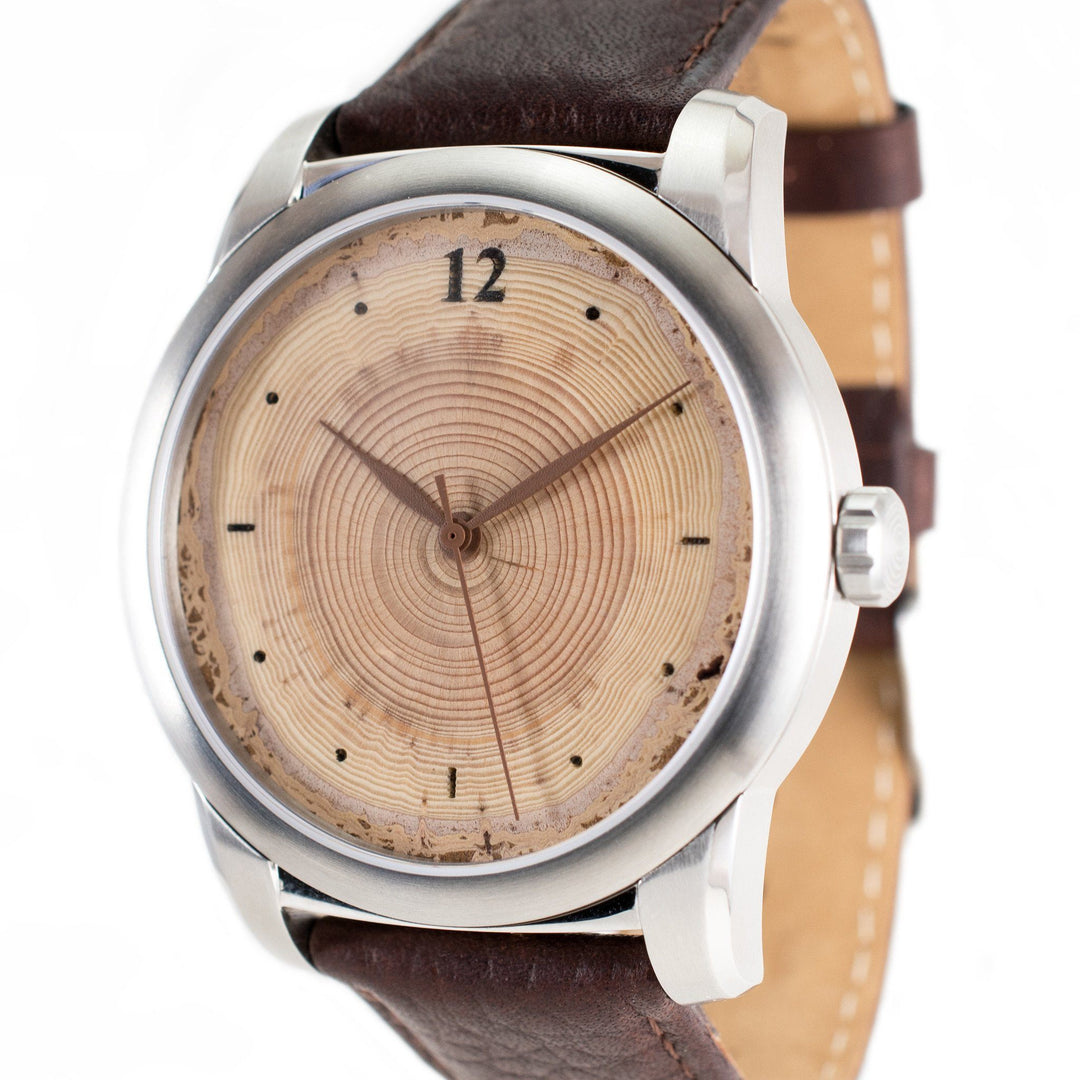 Custom Classic Wood Watch with tree ring dial and leather strap, showcasing nature's elegance in time.